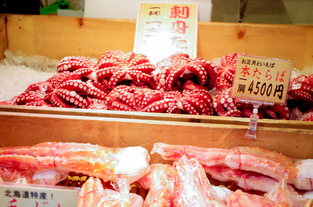 octopus and crab legs at Tsukiji Market in Tokyo. Photo by alphacityguides.
