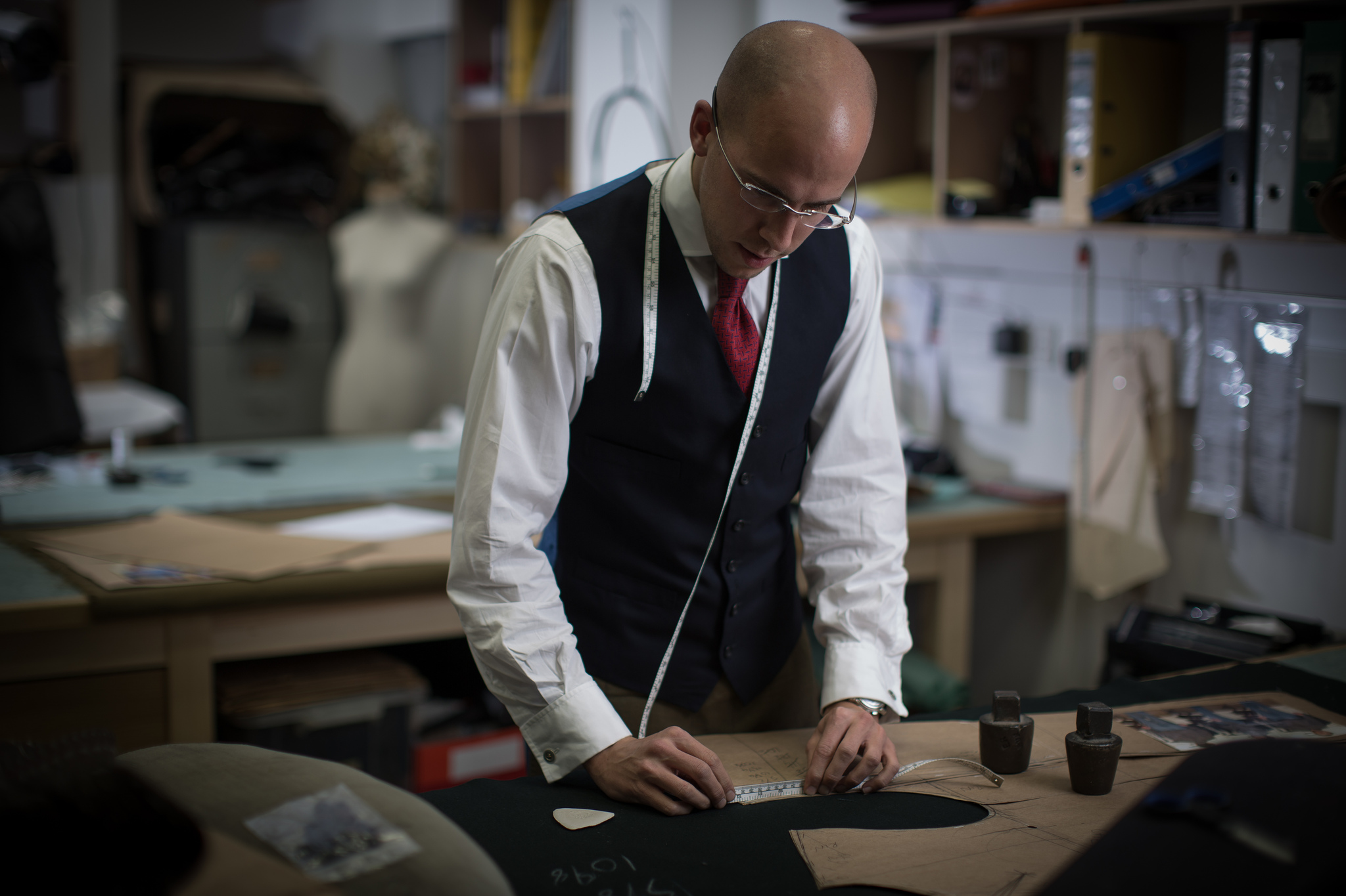 Tristan Thorne, Under Cutter at Dege & Skinner cutting a bespoke suit.