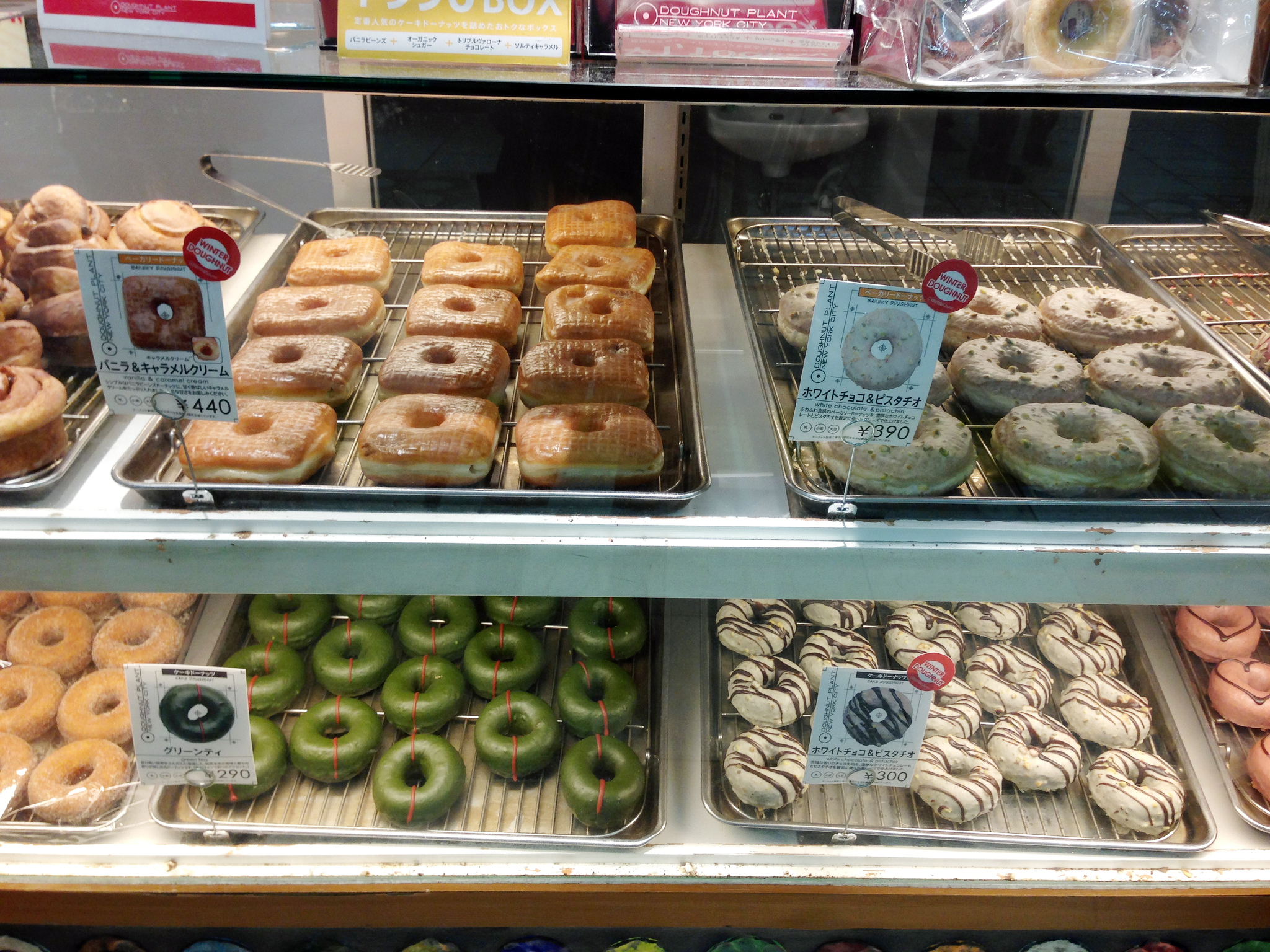 Doughnut display case at Doughnut Plant in Tokyo. Photo by alphacityguides.
