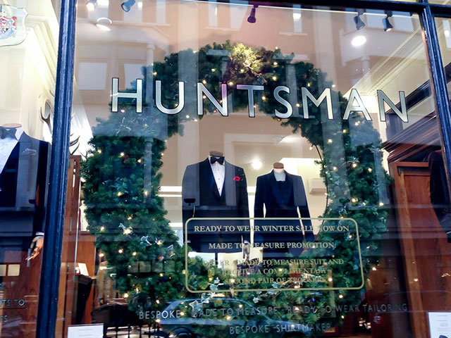 The Huntsman window display on Savile Row in London. Photo by alphacityguides.