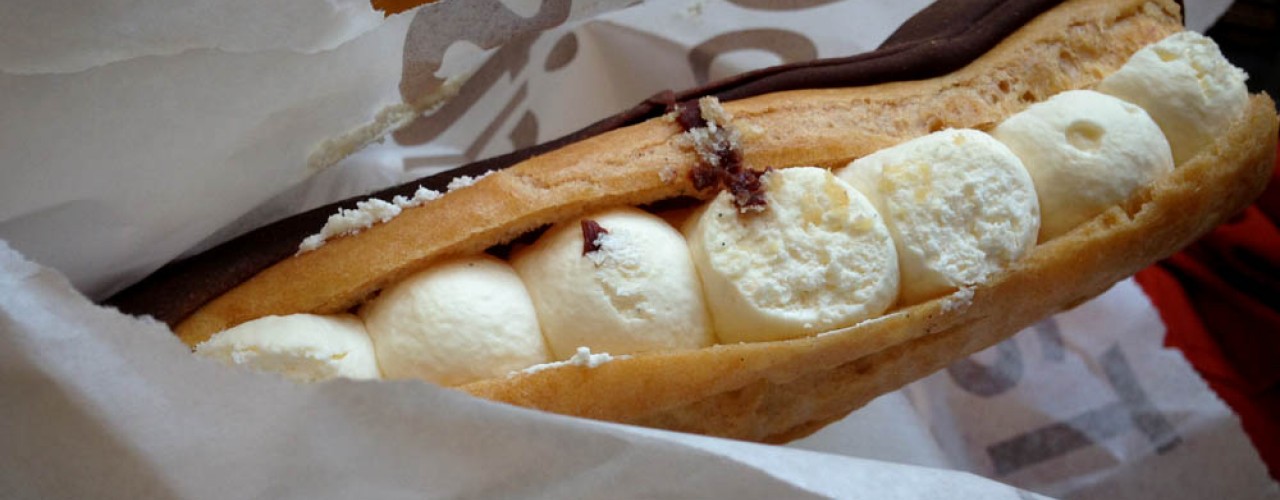 Chocolate Eclair with chantilly cream at Euporium Bakery in Covent Garden, London. Photo by alphacityguides.