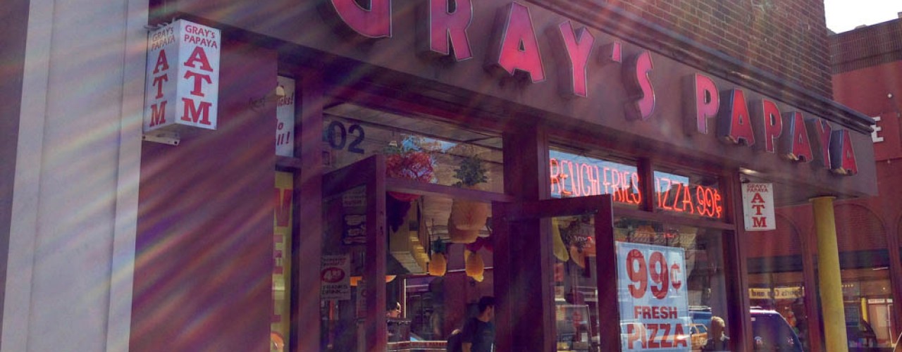Store front at Gray's Papaya in New York. Photo by alphacityguides.