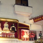 Store front and Lolita dress window display at Bodyline in Tokyo. Photo by alphacityguides.