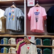 Designer t-shirt wall inside Uniqlo in Tokyo. Photo by alphacityguides.
