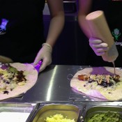 Burritos being made at Chilango Burrito in London. Photo by alphacityguides.
