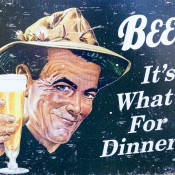 Vintage beer sign at Hell's Kitchen Market in New York. Photo by alphacityguides.