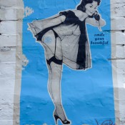 Artist WhIsbe vintage pin up style street art in London. Photo by alphacityguides.