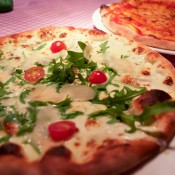 Pizza pie at Mama Pizzeria inside Mama Shelter Hotel in Paris. Photo by alphacityguides.