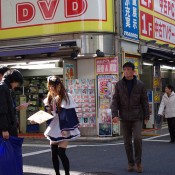 Maid advertising a maid café in Akihabara, Tokyo. Photo by alphacityguides. 