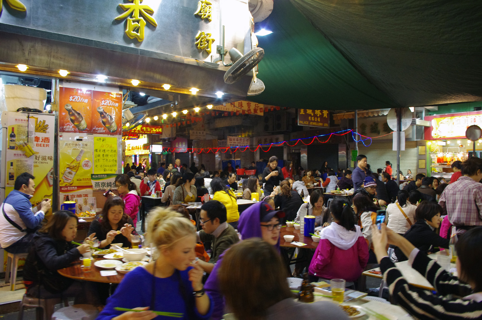 Temple Street Market dai pai dong's in Hong Kong. Photo by alphacityguides.